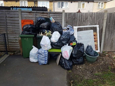 Professionals performing flat clearance in Leyton